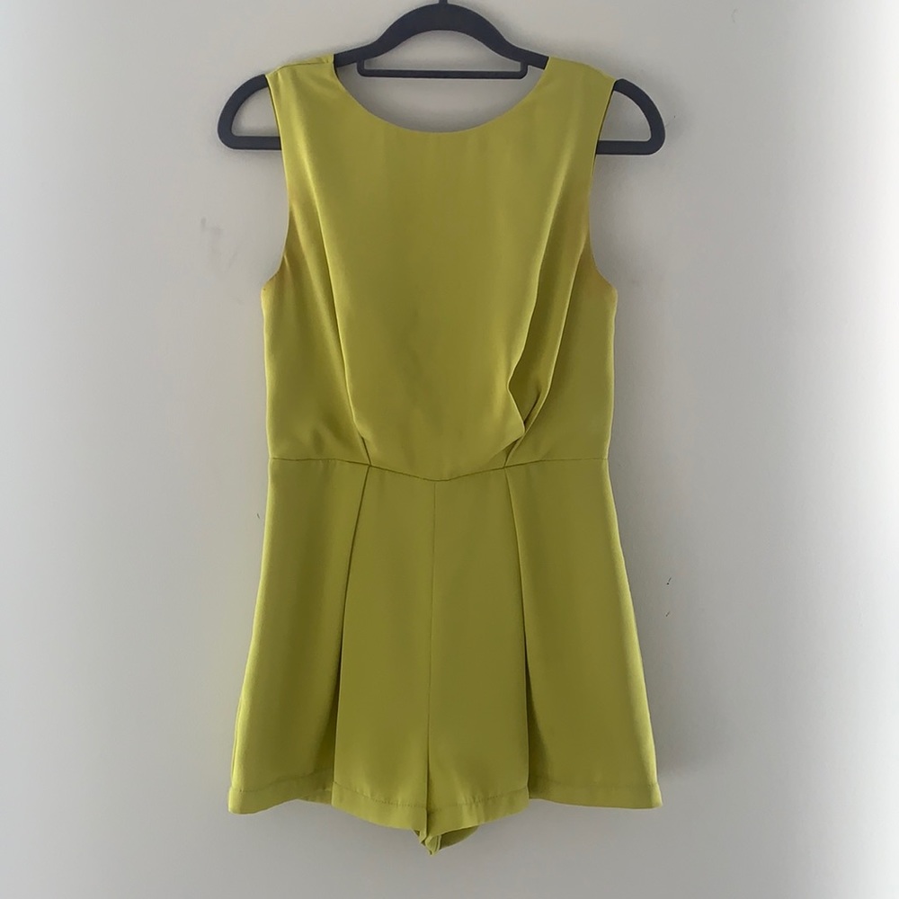 Neon green Topshop romper with black lace detail